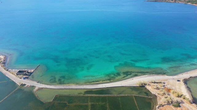 Turquoise water covering ancient city ruins near Elounda, Crete. Aerial shot
