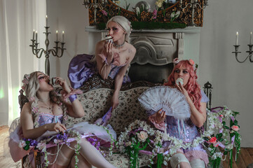 A girl dressed in the style of a Victorian boudoir, in a corset and crinoline of lilac color, in flowers