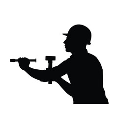 Silhouette of a construction worker with a hammer