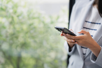 business woman use the smartphone. business successful technology concept