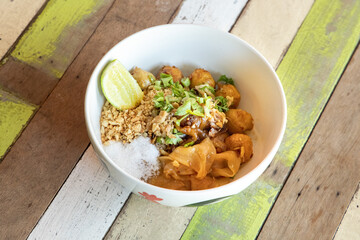 Delicious thai noodle bowl street market food photography colorful setting close-up culinary delight