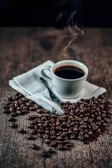 Fototapeta premium Warm Aromatic Coffee on Rustic Wooden Table