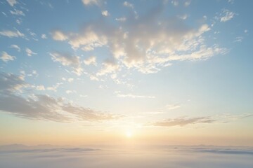 Fototapeta premium Skyward view of fluffy clouds, blue sky, and horizon during sunrise