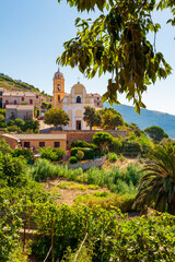 Latin church, in Carg&egrave;se, Corsica, France. Typical and picturesque hillside village. Hilltop town nestled on the coast above the Mediterranean sea.