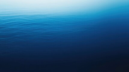 Calm blue ocean water surface reflecting sunlight, tranquil natural scenery, peaceful marine environment, serene seascape for relaxation and meditation.