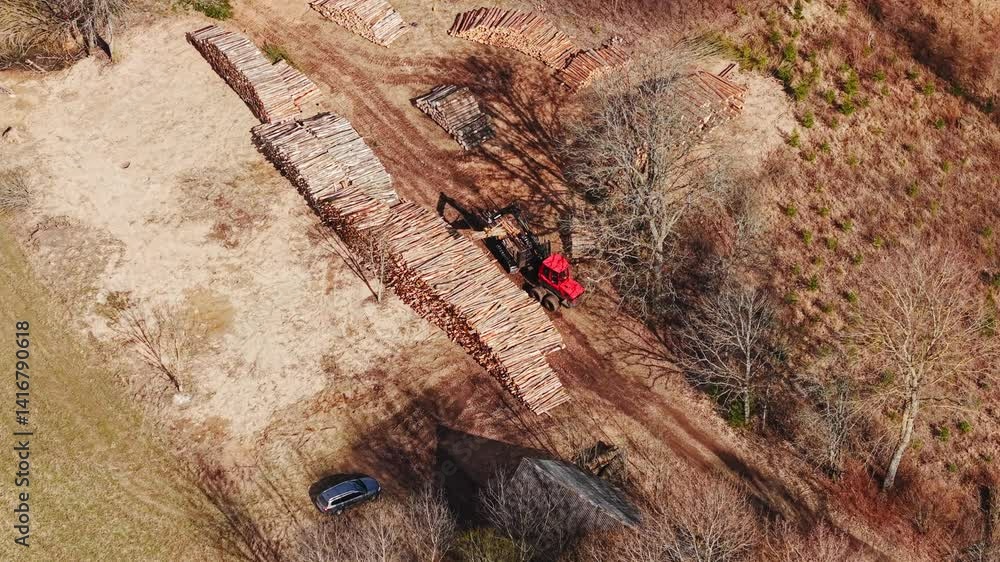 Poster top down view of log forwarder moving in circular path through cleared forest land