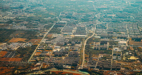 Beijing, China. View From Airplane Window On Multi-story Buildings Of Changhe Garden District In Beijing. Aerial View On Suburb. High-rise Houses Elevated View Cityscape Skyline. Urban Residential