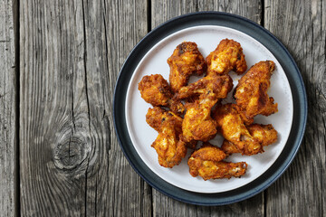 crispy fried chicken wings on a plate