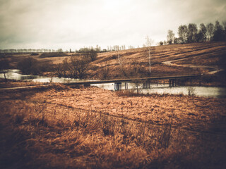 The bank of a small river in early spring in Russia