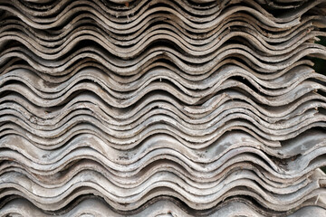 Old and very dangerous asbestos roof. Asbestos dust in the environment. Asbestos removal