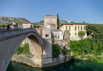 Mostar Bridge is a bridge located on the Neretva river passing through the city of Mostar in Bosnia and Herzegovina. The Mostar bridge was built 30 meters long, 4 meters wide and 24 meters above 