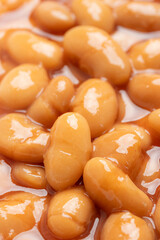Pile of baked beans in tomato sauce. Close up