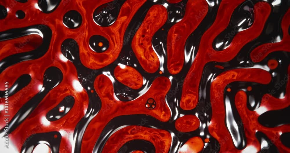 Poster microscopic shot of red and black alcohol inks mixing and swirling, creating abstract patterns and s