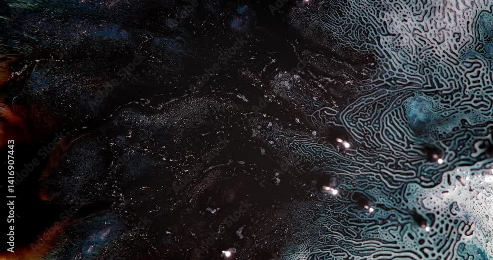 Poster dark alcohol inks swirl with shimmering particles and form intricate blue maze-like patterns capturi