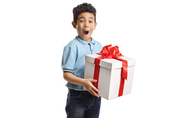Cute asian boy holding a big gift box