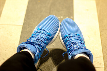 Blue sneakers for travelers that are safe