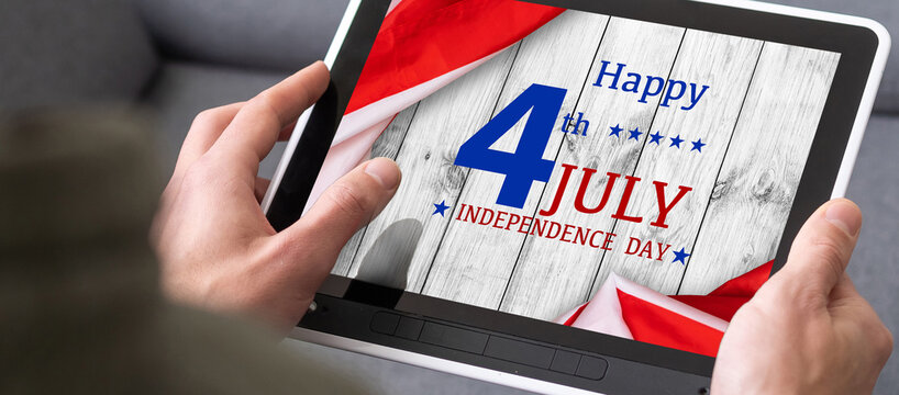 american national flag on the background, tablet pc with sample text. 4th of July Independence Day celebration concept