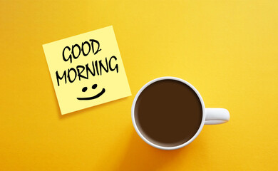 Good Morning and Have a nice day is shown using the text on the coffee cup. Breakfast with coffee