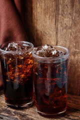 Cola drink with ice cubes