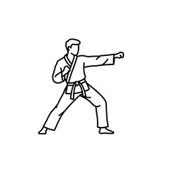 Obraz premium Karateka demonstrating powerful punch in martial arts stance 