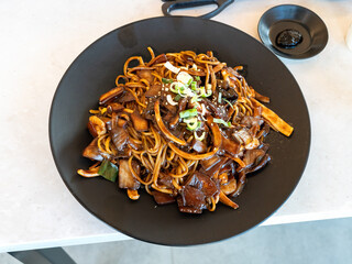 Delicious Jajangmyeon, jjajangmyeon, Korean-style Chinese noodle dish topped with thick sauce in...