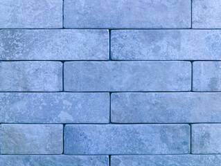 The brick wall is blue. Brick background. The texture of the blue brick. Brickwork.