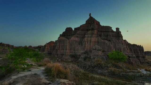 Landscape of Chakwal Canyons with unique rock formation and vegetations under gradient sky