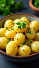 Steamed potatoes, chopped parsley, ceramic bowl, green, texture, home cooking