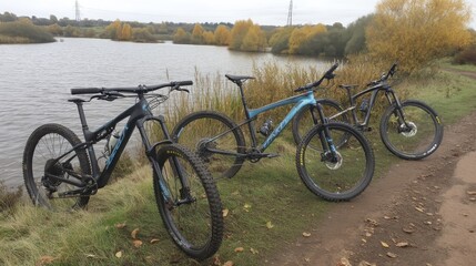 Fototapeta premium Bikes parked by a lake, ready for a family ride - trees landscape sunny together
