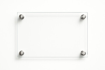 A modern, minimalistic clear acrylic sign holder with stainless steel standoffs, perfect for displaying information or branding in an office or retail space.