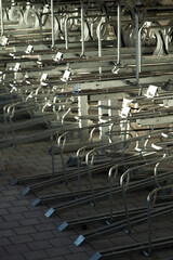 modern bike parking space in close up. empty bike rack with no bicycles. close up of a pile of metal pins