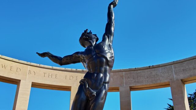Spirit of American Youth bronze statue, Normandy American Cemetery, France, Low angle pov