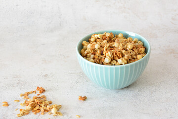 Granola in a blue bowl, a delicious and healthy breakfast option