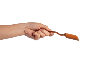 Brown plastic spoon in hand, isolated on transparent background