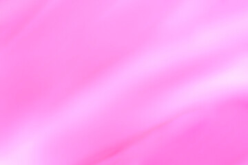 close up of smooth liquid pink watercolor paint brush strokes