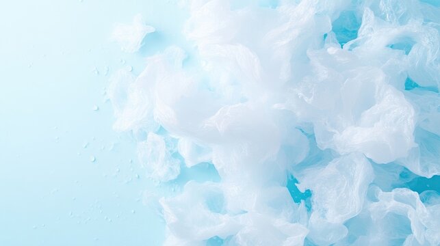 Light blue and white abstract cloud-like texture