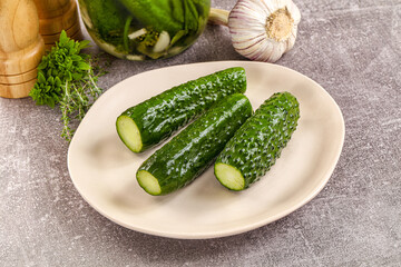 Homemade lighty salted cucumbers with herbs