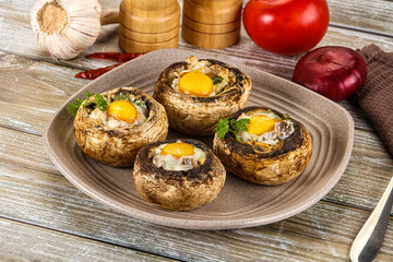 Baked champignon with quail egg