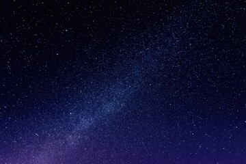 Fototapeta premium Cosmic-inspired Shimmer Texture Illustrates a Starry Night Sky With Twinkling Stars and Deep Blue Hues