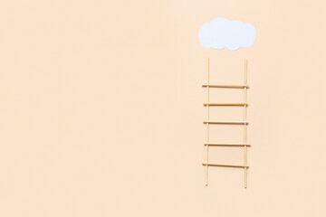 Ladder with cloud on beige background