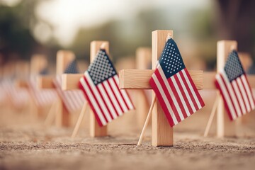 Small Folded Flags Positioned on Wooden Crosses in a Solemn Memorial Setting During Daylight Hours
