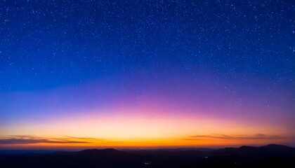 Fototapeta premium Twilight sky with gradient from purple to deep blue, soft stars beginning to appear, peaceful dusk scene