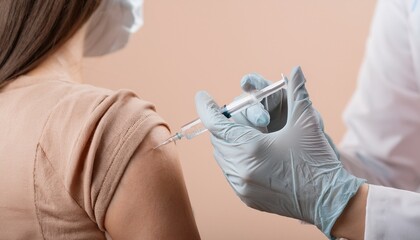 a medical professional administering an injection on a person's shoulder. This image captures the essence of healthcare and preventative measures