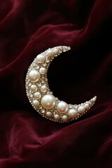 Elegant Pearl-Studded Crescent Moon on Rich Velvet Background.