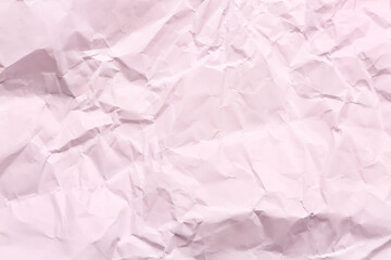 Texture of pink crumpled paper, closeup