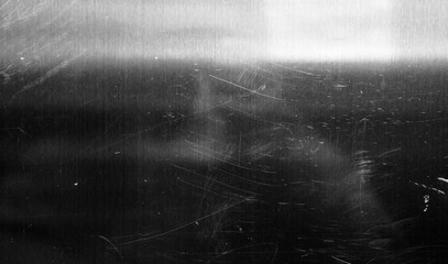 Grainy film texture with vintage, faded specks and scratches