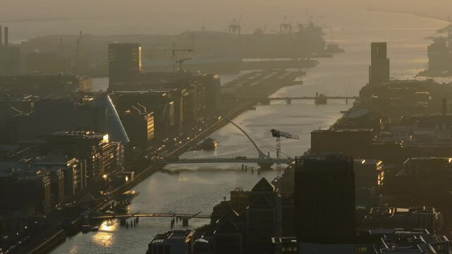 Breathtaking 4K Cinematic Drone footage capturing the magical golden hour sunrise over Dublin, Ireland. As the first light spills across. Smithfield 47