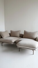 Tan couch with pillows on it