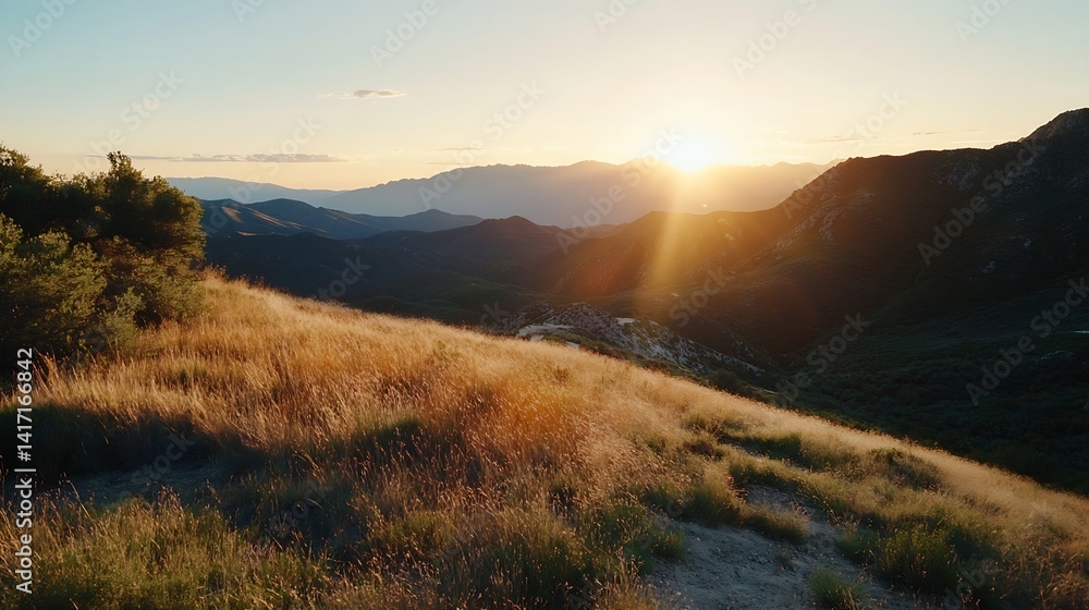 Poster breathtaking mountain view with sun setting behind peaks and golden grass : generative ai