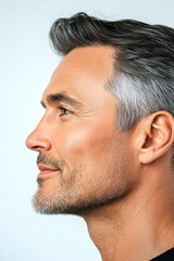 Obraz premium Concept art of style for aging men. A charismatic and fashionable male with a trendy look. Pure white solid background. Classy men's side part haircut - midlife white man with grey hair.